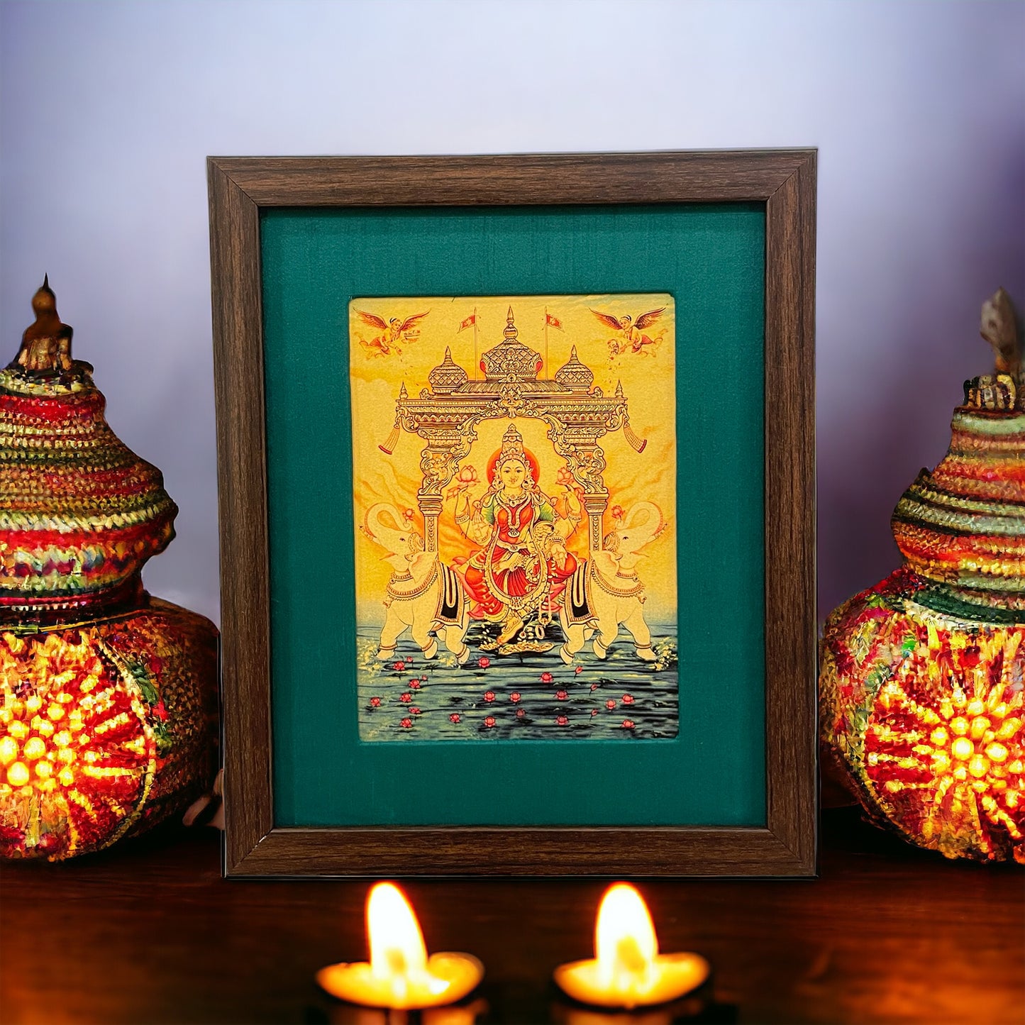 Verdant Blessings: Gajalakshmi Devi's Divine Presence in Green Silk With Brown Frame