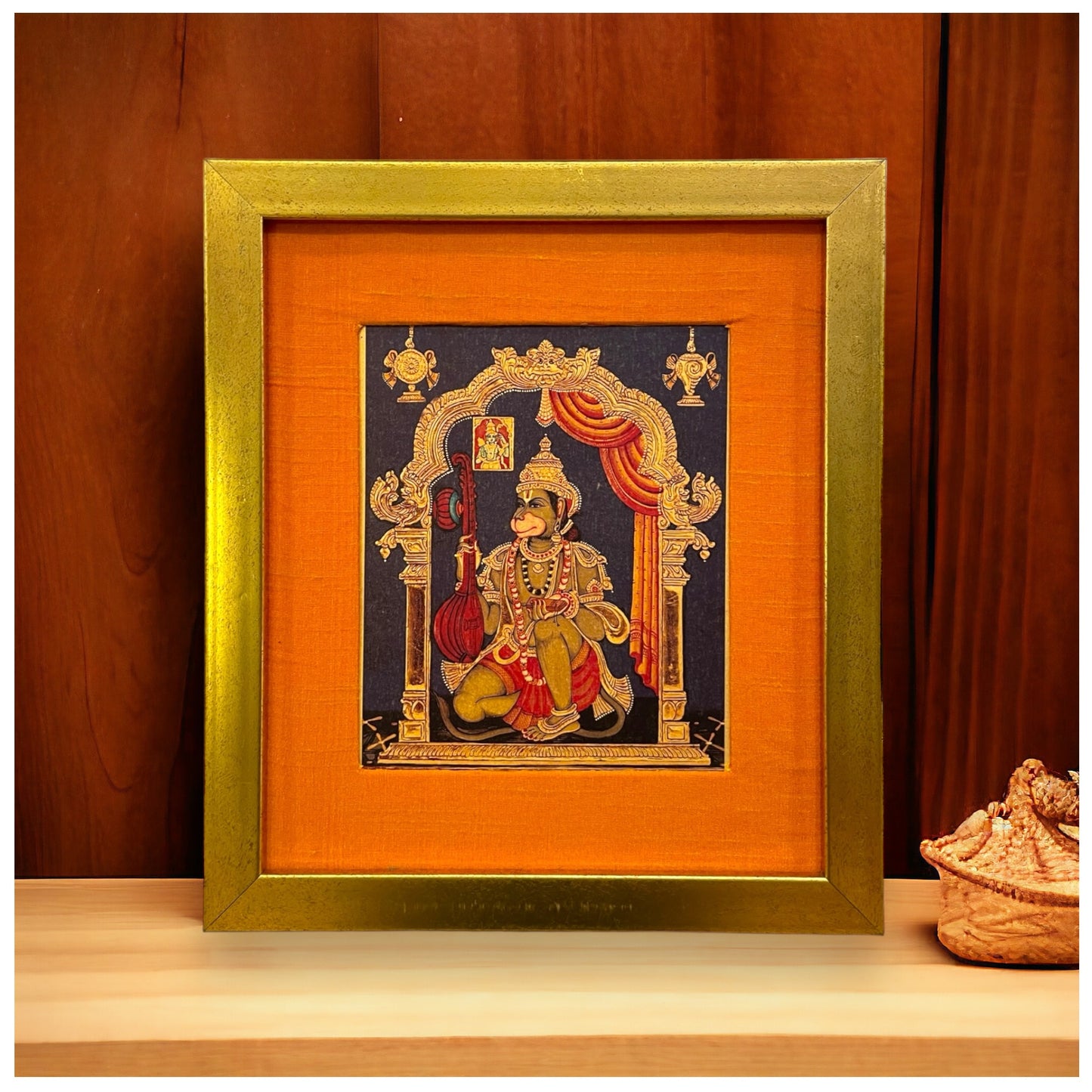 "Divine Harmony: Hanuman Veena Artwork - Gold Leaf, Orange Silk Mount, Gold Frame"