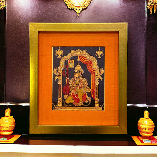 "Divine Grace" : Gold Leaf Printed Hanuman in Orange silk with Gold Frame