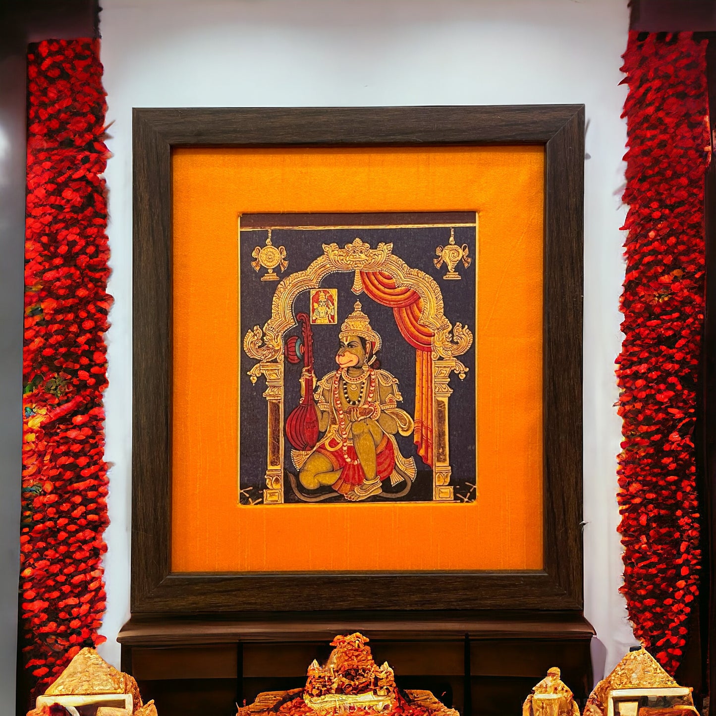 Divine Musician Hanumaan with Veena: 22crt gold leaf paper photo orange silk with brown frame