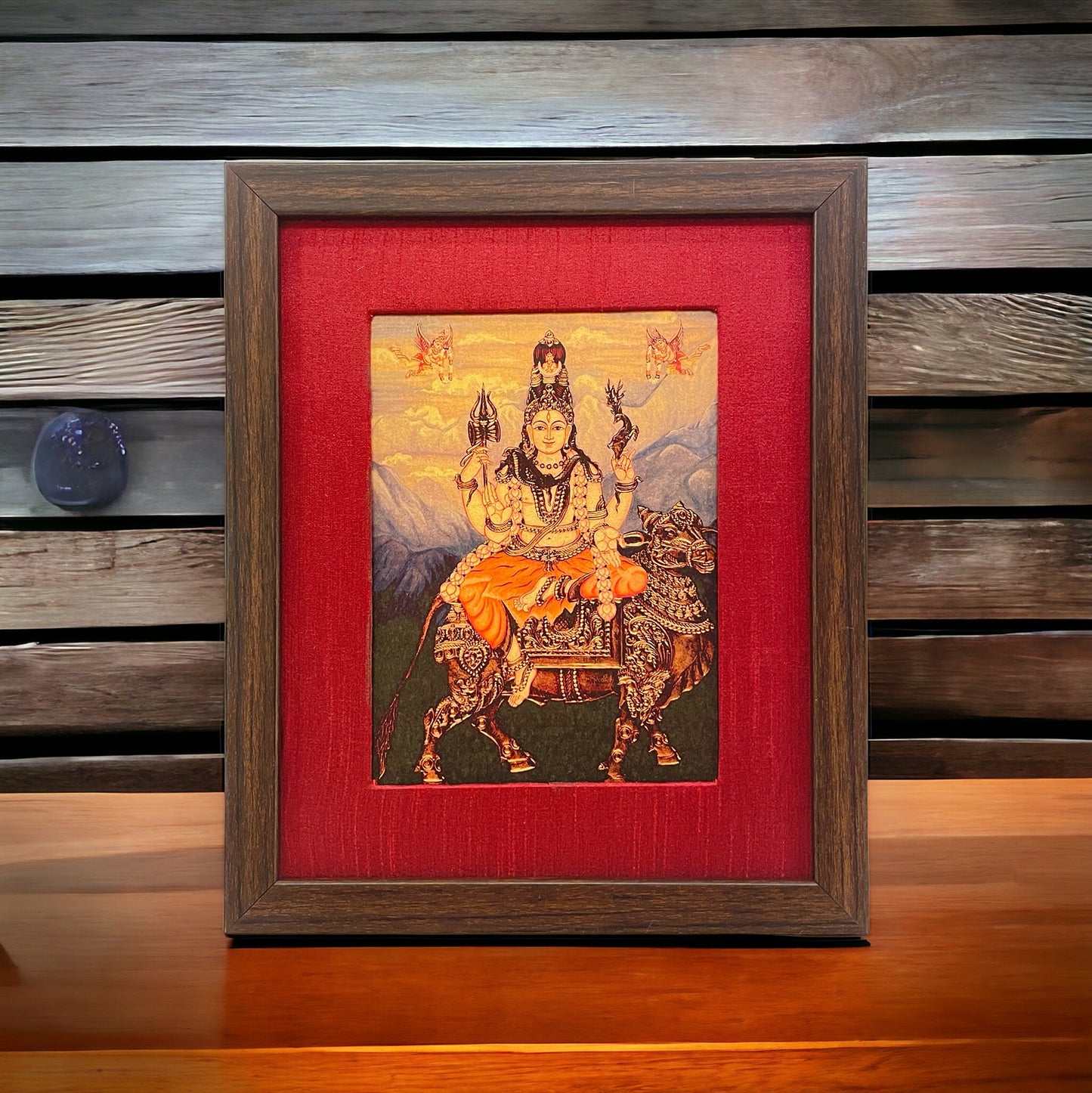 Divine Harmony: Shiva on Nandi in Resplendent Red Silk with Brown Frame