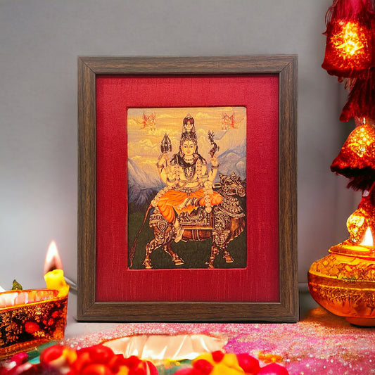 Divine Harmony: Shiva on Nandi in Resplendent Red Silk with Brown Frame