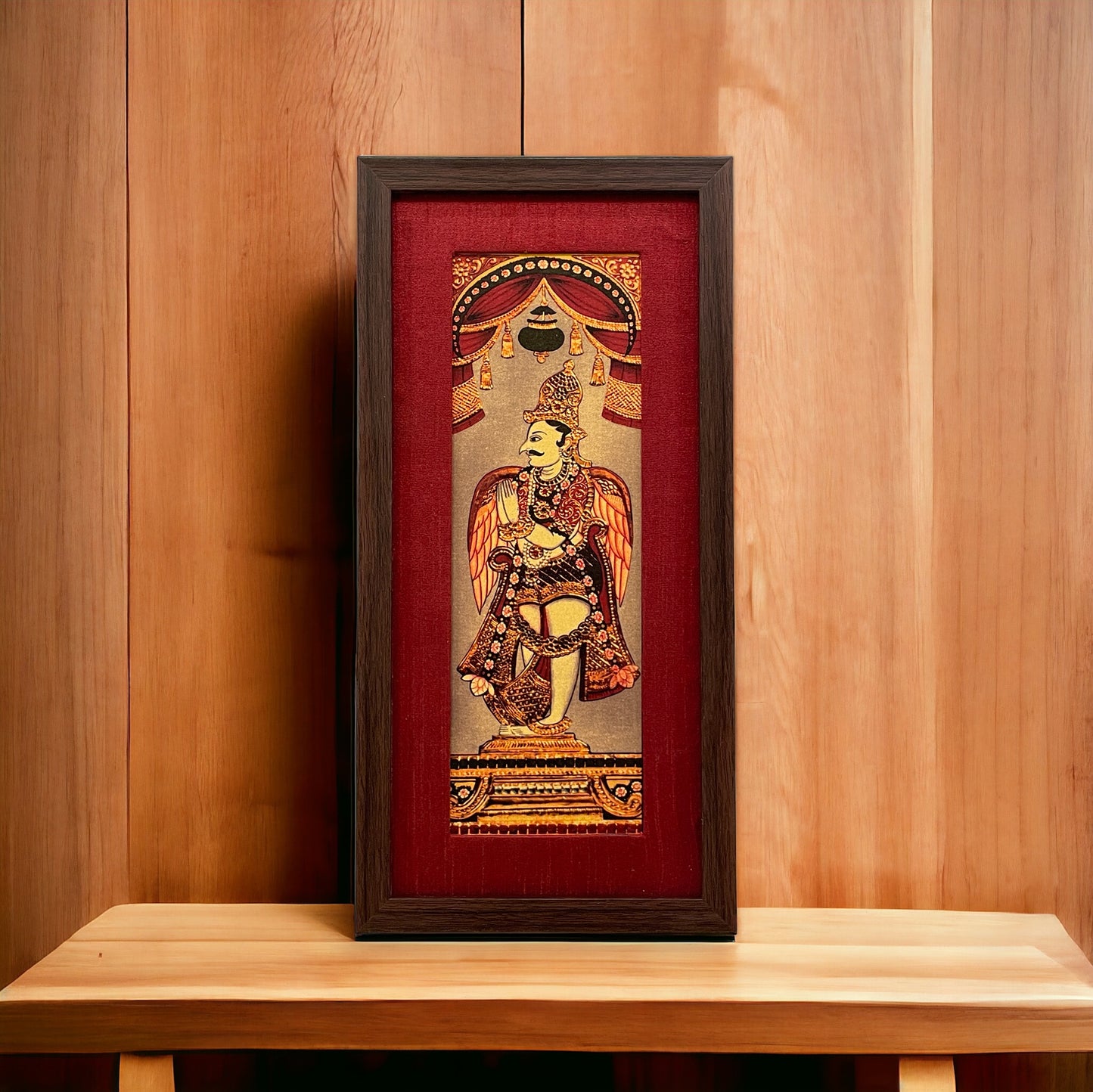 Divine Grace: God Garuda's Majestic Depiction in Red Silk With Brown Frame