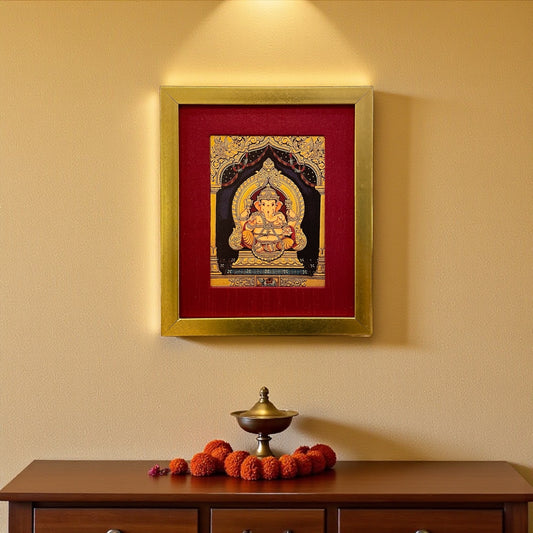 Divine Splendor: Ganesha's Blessings in Red silk with Gold Frame