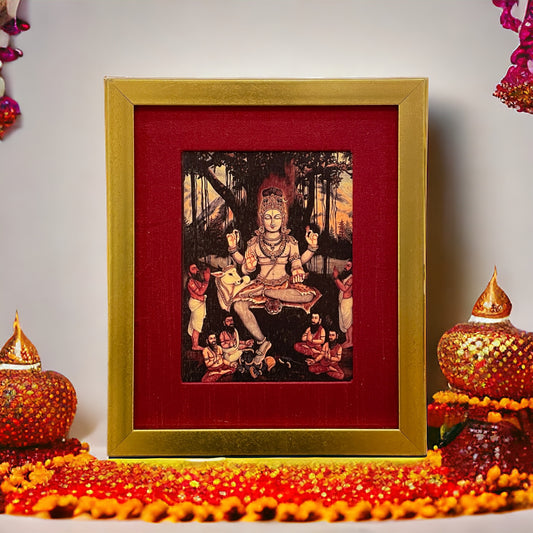 Sacred Illumination: Dakshina Murthy's Wisdom in Red silk with Gold Frame
