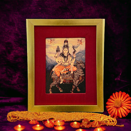 Divine Harmony: Shiva on Nandi in Resplendent Red Silk with Gold Frame