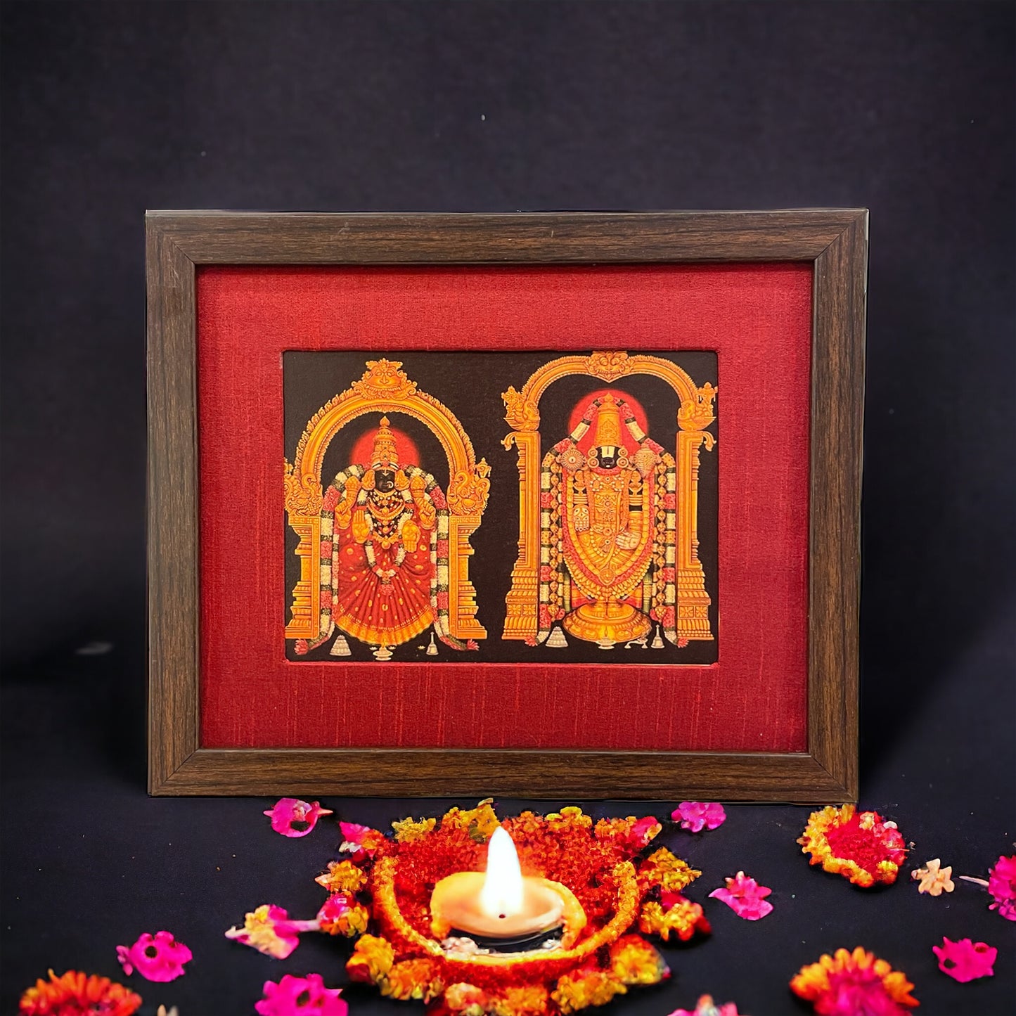 Divine Depiction of God Venkateswara and Goddess Padmavathi in Red Silk Ensemble With Brown Frame