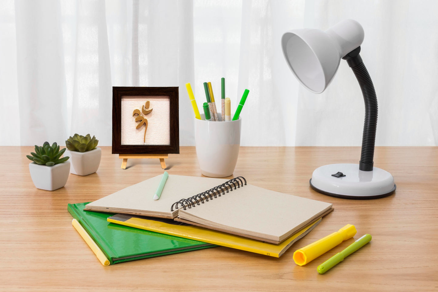 Vastu Aum 
 Symbol in Metal on white silk backdrop with a display stand.