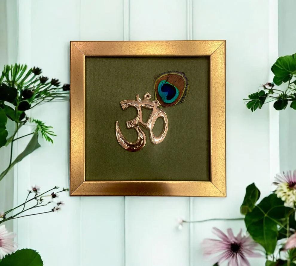 Brass Om with peacock feather & wine red silk in Gold frame
