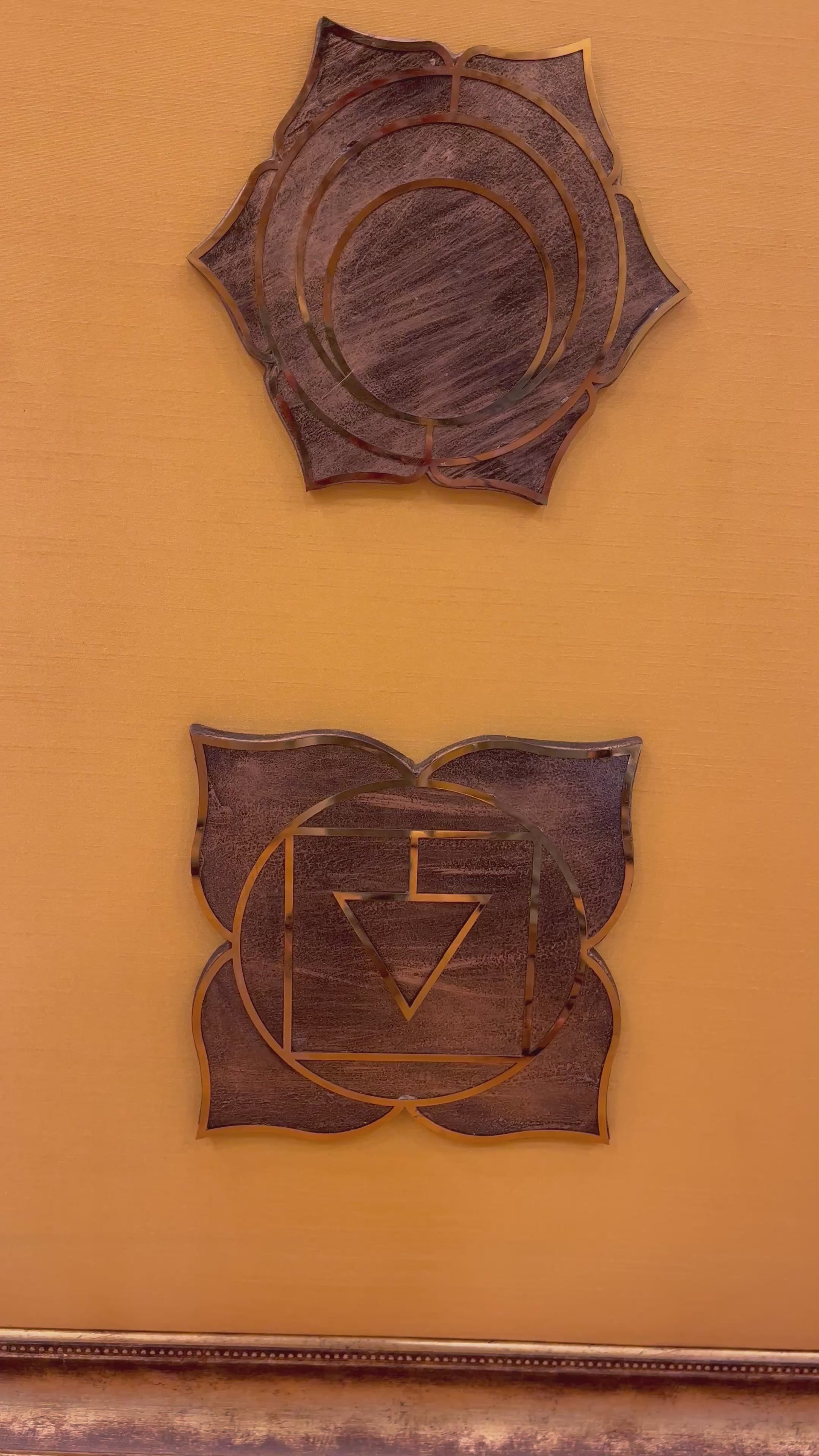 Load video: 7 Chakra Wall Art | Sacred Energy Symbols crafted in titanium with brass lotus embellishments on Golden Silk | Framed decor to make a statement.